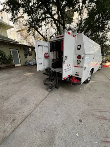 Magnet Plumbing service vehicle on-site for Grease Trap Cleaning in San Pedro Hill